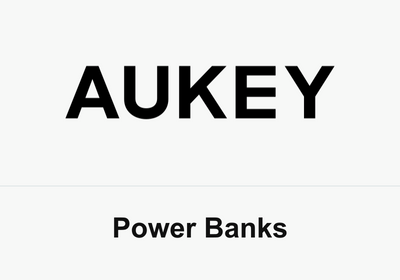 Aukey Power Bank MagLink 6700 with packaging and accessories on a table.