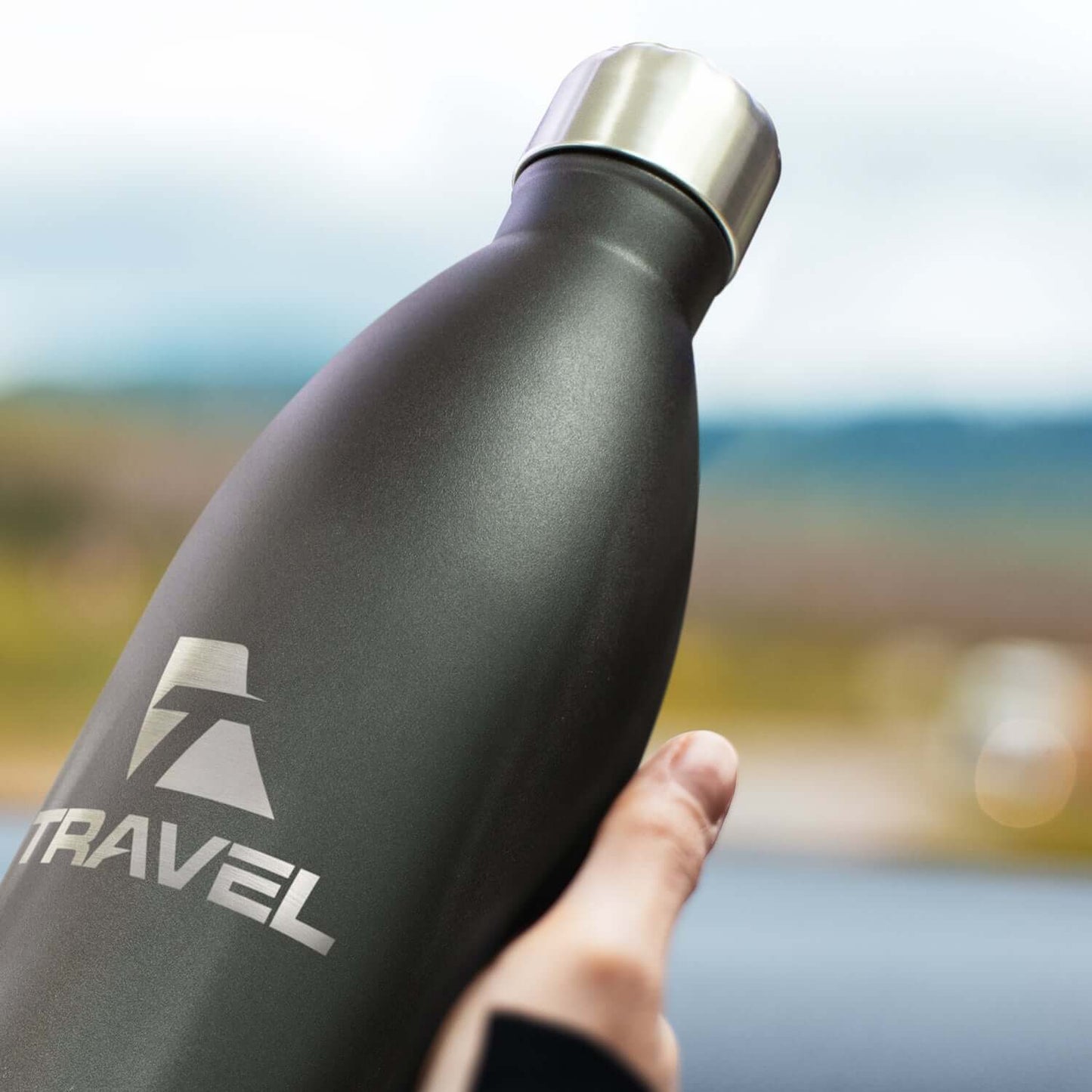 Mirage Vacuum Bottle 1L held by a person, ideal corporate gift for travel enthusiasts.