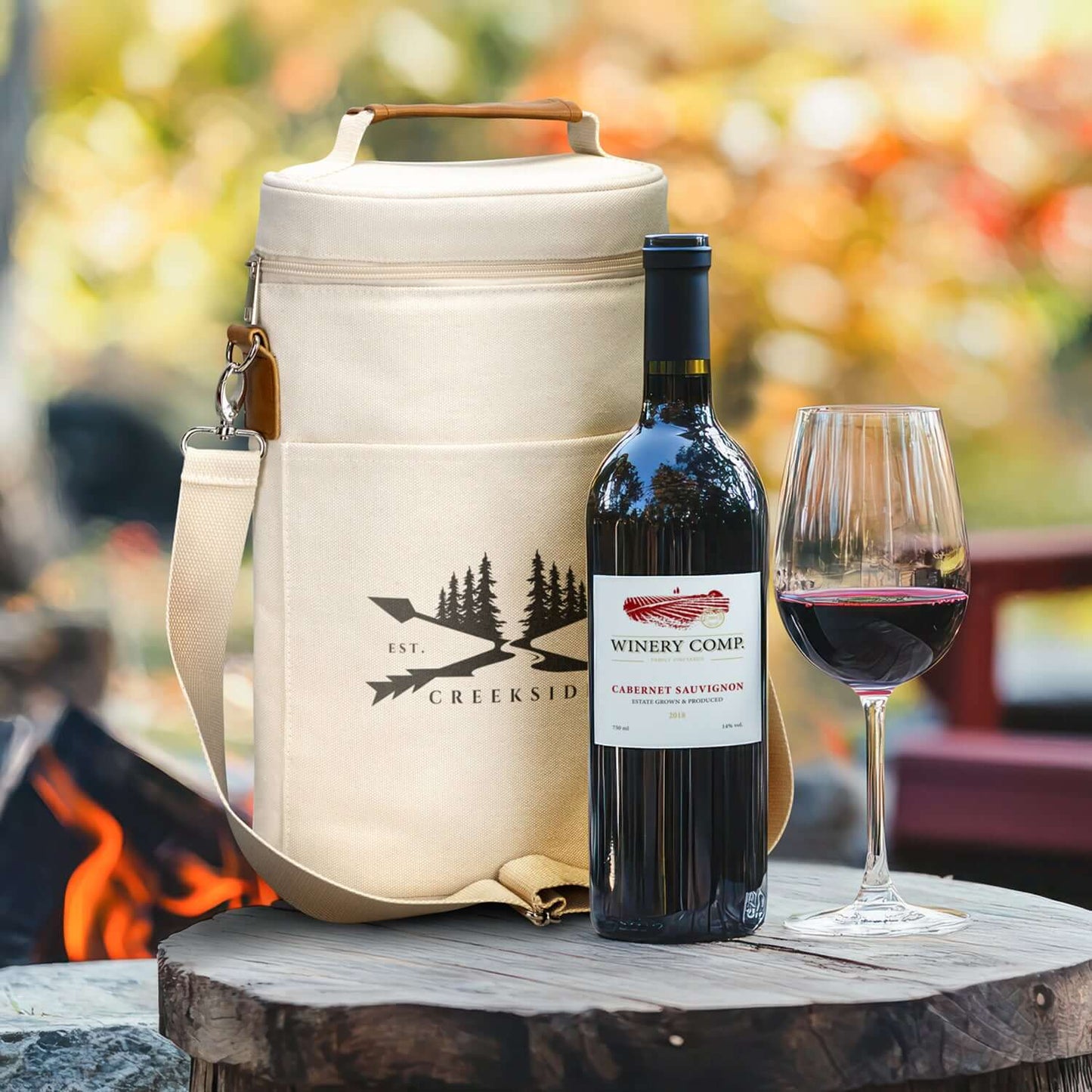 Colton Double Wine Cooler Bag with a bottle of wine and glass outdoors, perfect for corporate gift giving.