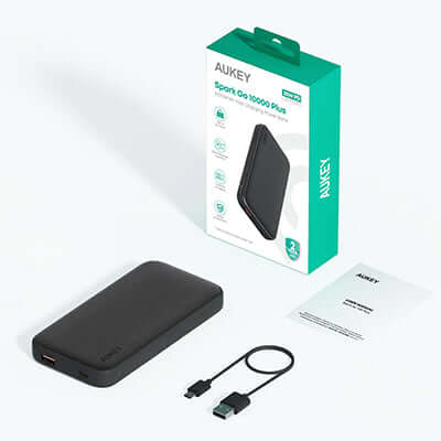 Aukey PB-Y46P Spark Go 10000mAh Plus Fast Charging Power Bank with packaging and cables.
