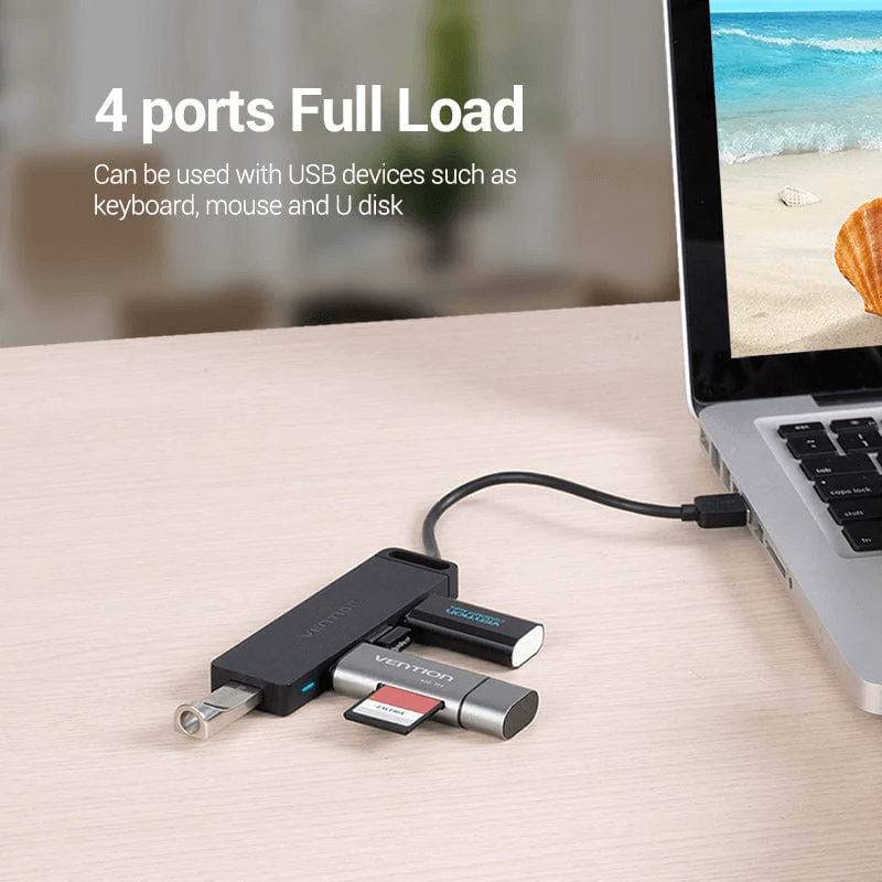 Vention 5-in-1 USB 2.0 Hub with 4 Ports connected to a laptop with multiple USB devices.