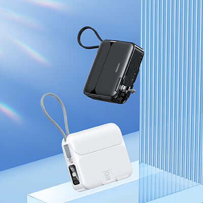 Remax RPP-553 Powerbank with Wall Plug 20000mAh in black and white against a blue background.