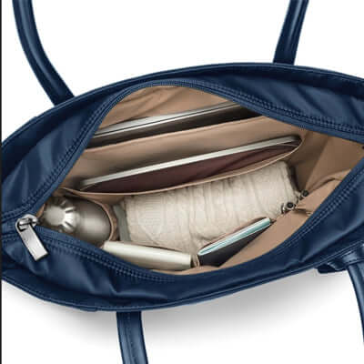 Interior view of Briggs & Riley Rhapsody Vertical Tote Bag showing organized compartments and spacious layout.