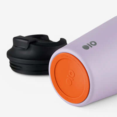 Montigo Sense Coffee Cup Regular in purple with an orange base and black cap, ideal Corporate Gift for coffee lovers.