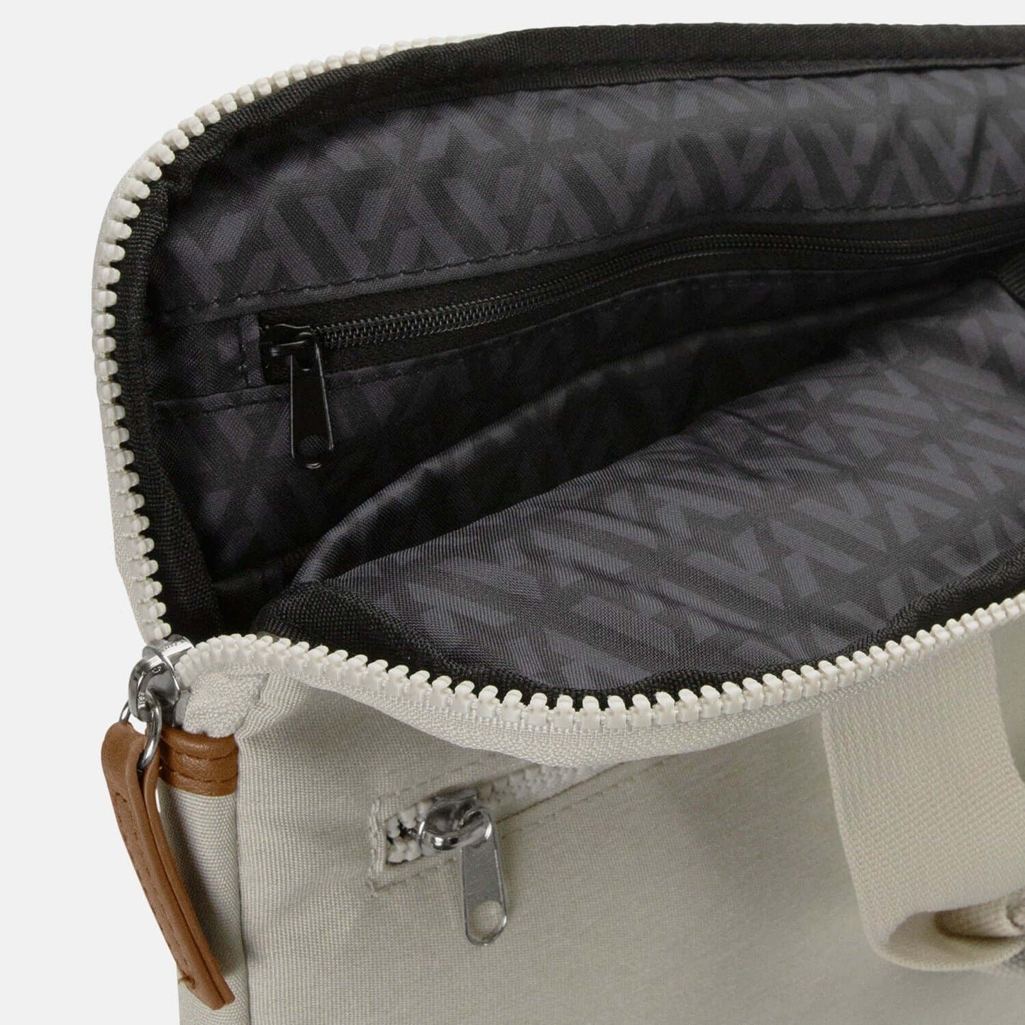 Interior view of the ARCHER Galileo Laptop Bag showing zippered pockets and padded compartment for devices.