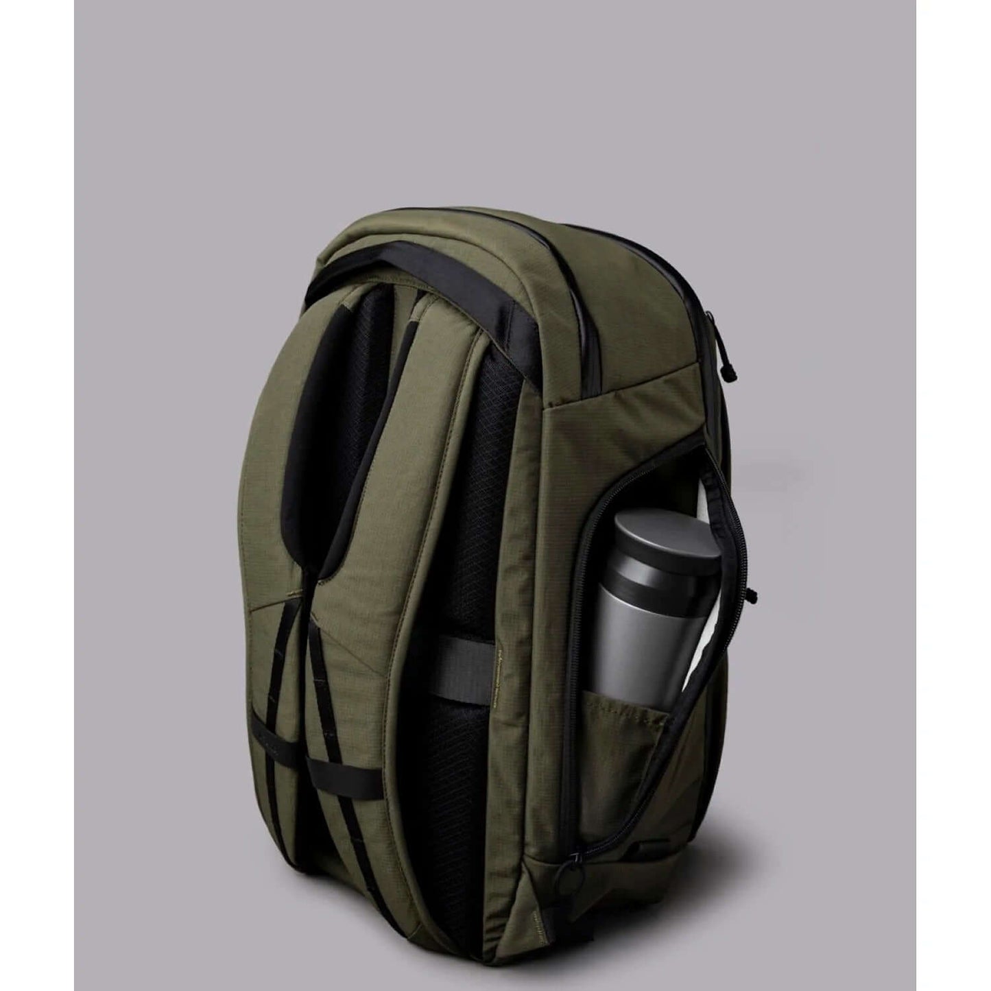 ALPAKA Traverse Backpack 30L side view with water bottle pocket, ideal for corporate gifts.