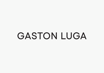 Gaston Luga Bag Collection featuring stylish fanny packs in mint green and gray for a trendy look.