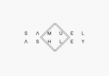 Samuel Ashley Wallets Collection featuring elegant wallets in minimalist colors on a modern background.