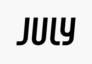 July Packing Bags Collection featuring four stylish black packing cubes for organized travel.