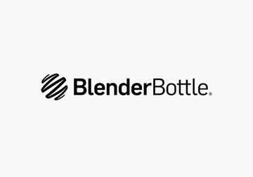 BlenderBottle on a marble pedestal with a wire whisk and soft lighting, perfect for hydration and nutrition on the go.