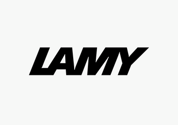 Lamy fountain pen in navy placed beside a box, showcasing precision design for corporate gifts.