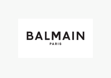 Balmain corporate gift collection featuring elegant pens in a premium presentation box.