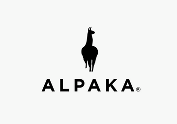 Man exploring the outdoors with Alpaka Bag and crossbody bag, showcasing versatile style and function.