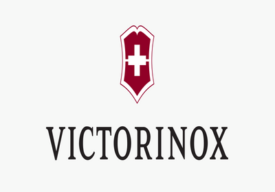 Red shield with a white cross above the black VICTORINOX wordmark on white