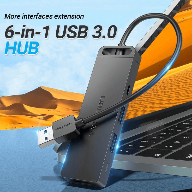 Vention 6-in-1 USB 3.0 Hub connecting to laptop, showcasing versatile connectivity and expansion.
