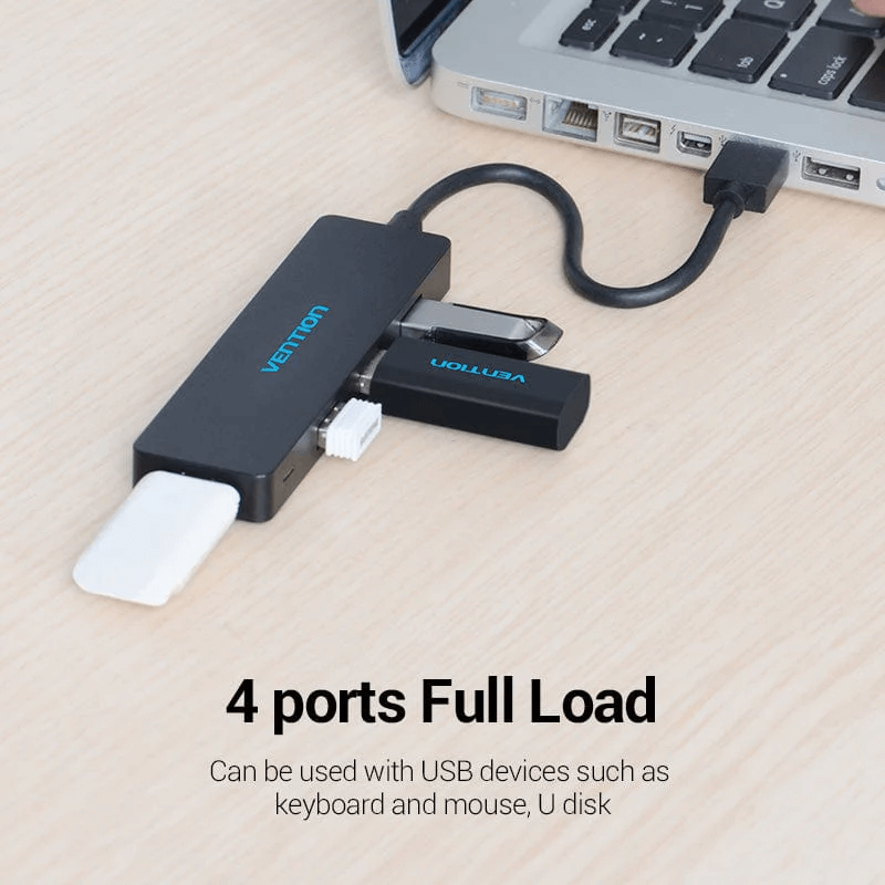 Vention 4-in-1 USB 3.0 Hub connected to a laptop, showcasing four ports for multiple USB device connections.