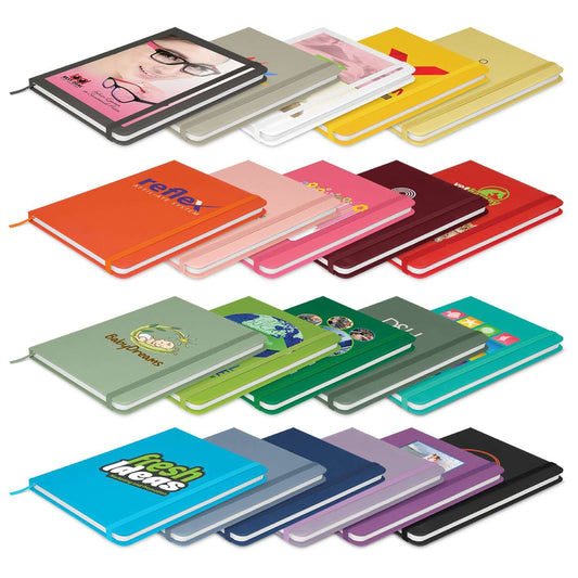 Array of colorful Omega Notebooks with various designs, perfect as corporate gifts.