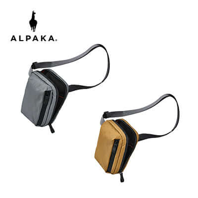 Alpaka Metro Sling X-Pac VX21 in gray and yellow, perfect for hands-free adventures and urban mobility.