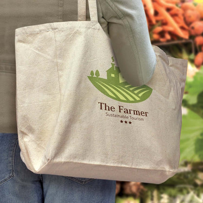 Galleria Cotton Tote Bag held by a person showcasing its sustainable design and spacious interior.