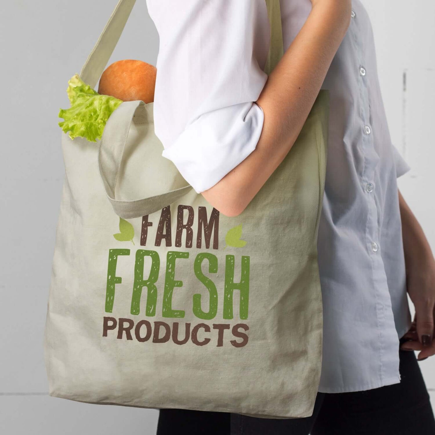 Cotton Shoulder Tote Bag featuring a person holding a bag with 'Farm Fresh Products' design and vegetables inside.