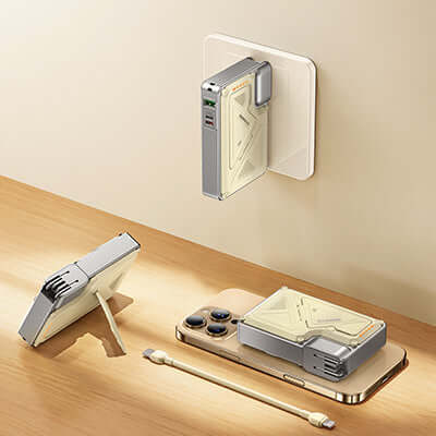 Remax CP-16 Magnetic 15W Wireless Charger with Wall Plug on a wall with accessories on a wooden table.