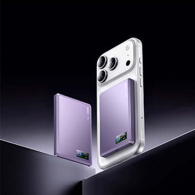 Remax FP-37 Magnetic Suction Wireless Charging Powerbank next to smartphone on a sleek black background.