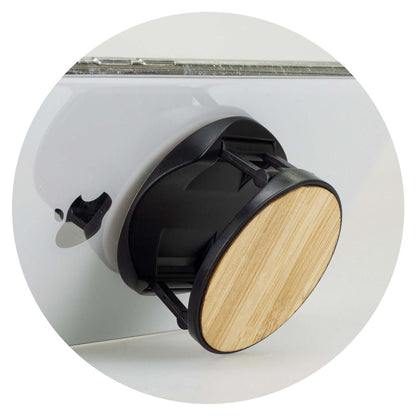 Bamboo Phone Holder attached to a mobile device, showcasing its sleek design and secure grip for easy usage.