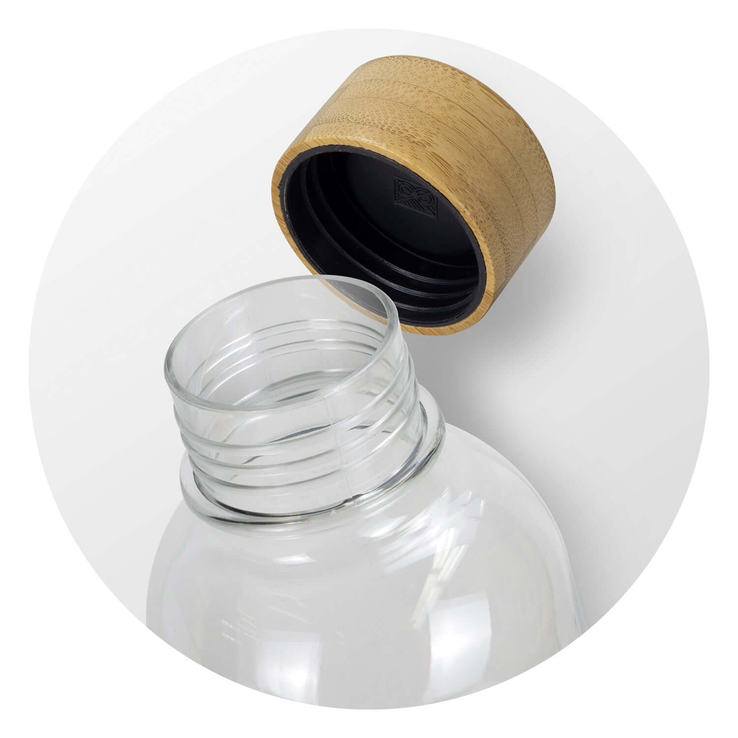 Close-up of RPET Bottle with bamboo lid showcasing eco-friendly design and silicone seal.