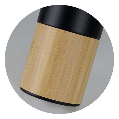 Close-up of the natural bamboo trim of the Mica Vacuum Bottle, showcasing its elegant design for corporate gifts.