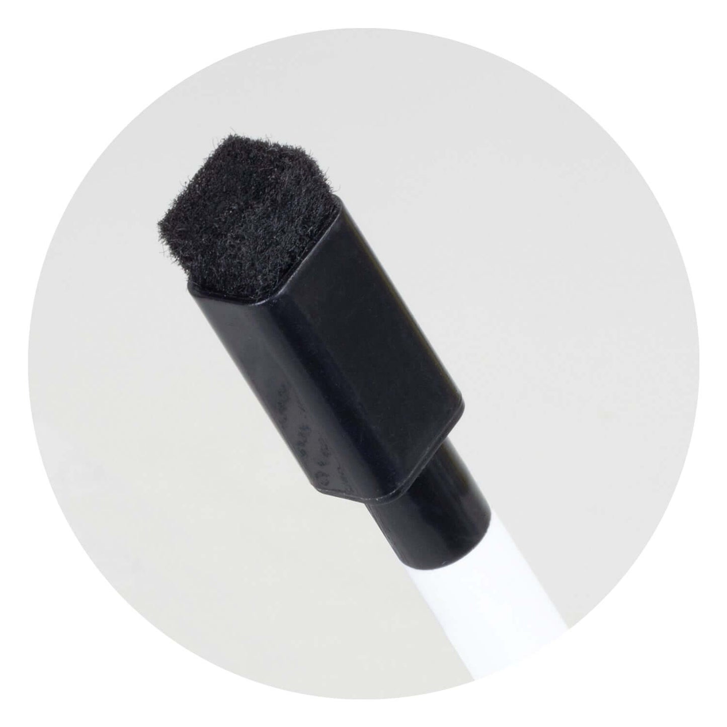 Black eraser tip of a dry erase marker, ideal for use with a Desk Whiteboard Notebook.