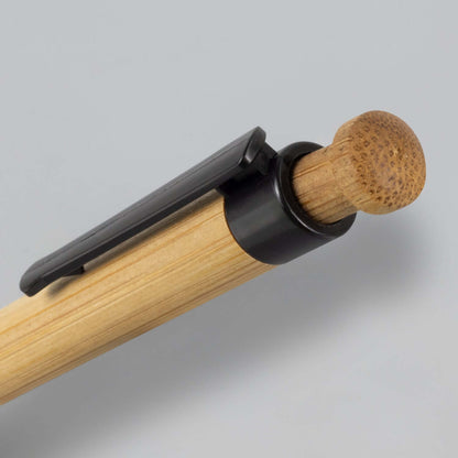 Close-up of the Harvest Bamboo Pen showing natural bamboo barrel and sleek black trim; ideal corporate gift.