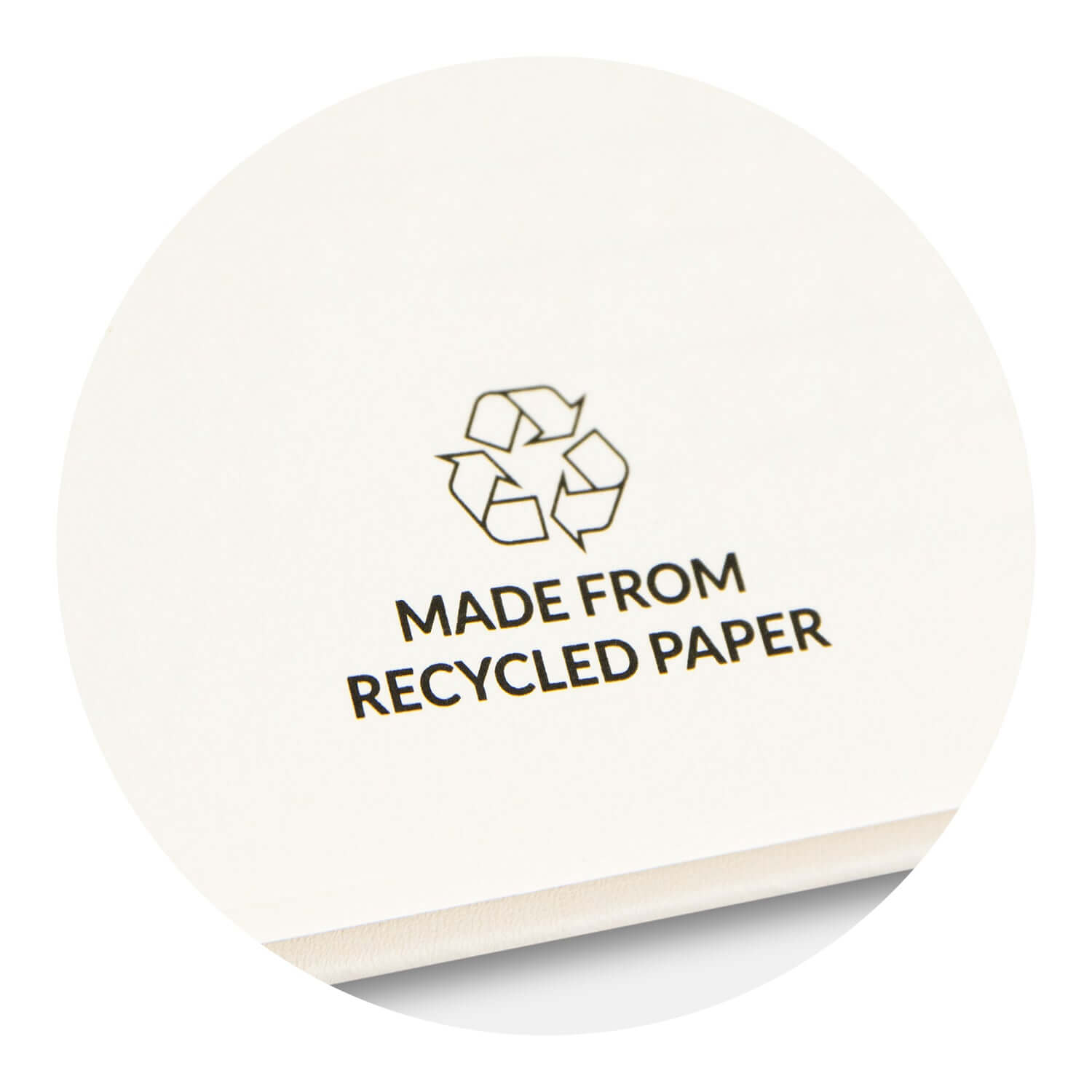 Made from recycled paper logo featured in Harvard Recycled Notebook, emphasizing eco-friendly materials.