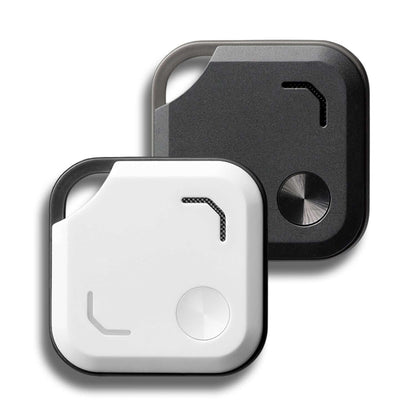 VibeTag Bluetooth Tracker in black and white, stylish design, perfect for corporate gifts and keeping track of essentials.