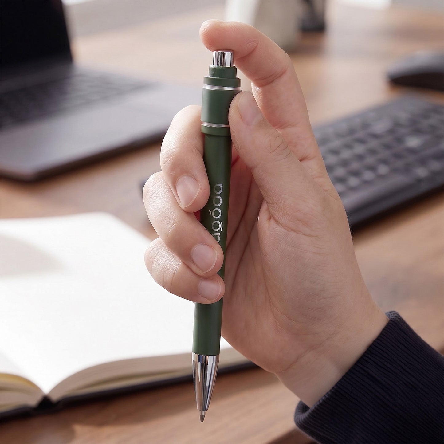 Eon Spinner Pen held in hand, showcasing its retractable, recycled aluminium design, ideal for corporate gift.