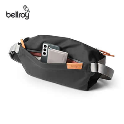 Bellroy Sling Mini bag with phone and essentials visible, perfect as a corporate gift.