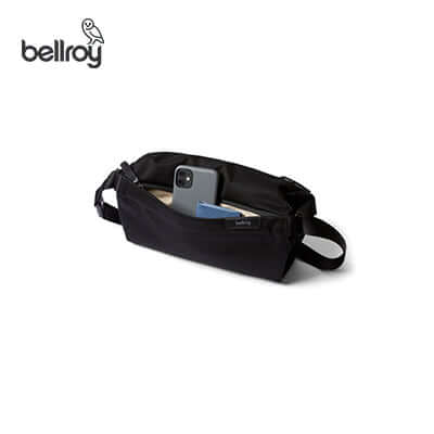 Bellroy Sling Bag with phone and card holder showing organization features.