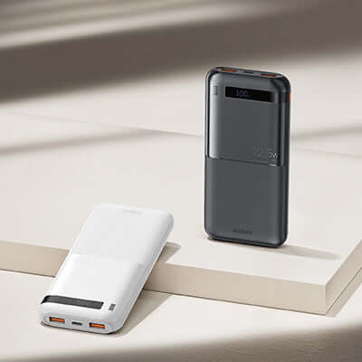 Remax RPP-71 Fast Charging Powerbank 10000mAh in white and black on a surface.