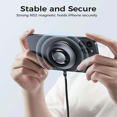 Aukey LC-G10 Qi2 Magnetic Fast Wireless Charging Active Cooling with Magnetic Ring holding a smartphone securely with N52 magnet.
