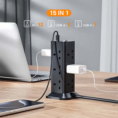 TESSAN Socket Tower 12 Ways Outlet Extension Plug with Multi Plugs on a desk with laptops and devices.