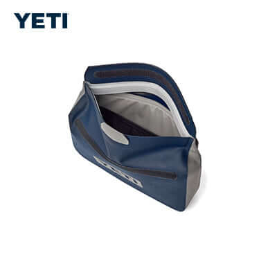 Yeti SideKick Dry® 3L Waterproof Gear Case displayed open, showcasing its spacious interior for essentials.