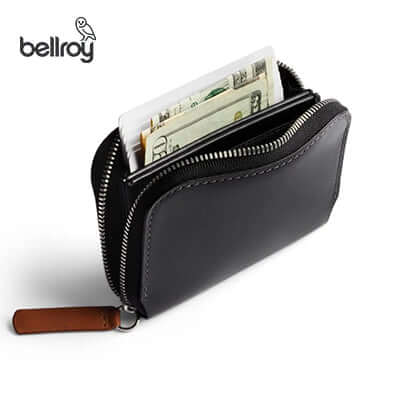 Bellroy Folio Mini Wallet displayed with cash and cards, ideal for corporate gift giving.
