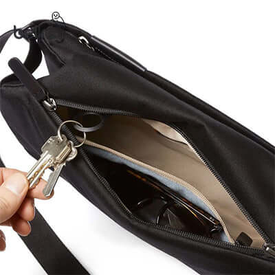 Interior view of Bellroy Sling Bag showing soft-lined pouch and key clip, highlighting its organization features.