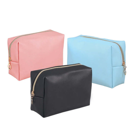 PU Cosmetic Accessories Pouch in pink, blue, and black colors, showcasing a stylish and compact design for cosmetics.