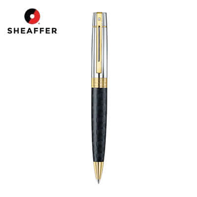 Sheaffer Engraved Black Ballpoint Pen with Chrome Cap and Gold Trims, a luxurious writing tool.