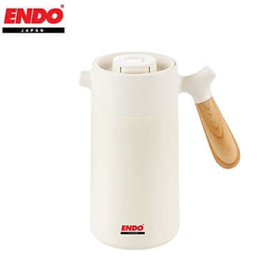Endo 1.5L Double Stainless Steel Handy Jug with a wooden handle and press-to-dispense feature.