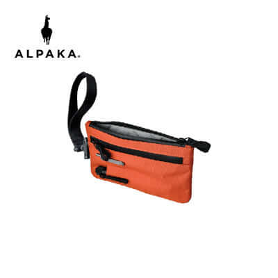 Alpaka Zip Clutch Cayenne RX30 + Hand Carry Strap in vibrant orange with detachable hand strap.