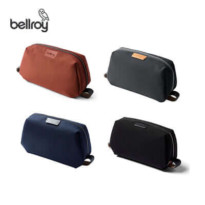 Bellroy Toiletry Kit Pouch in four colors displayed for organizational travel convenience, ideal as a corporate gift.