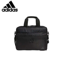 adidas Shoulder Bag in black featuring adjustable straps and zippered pockets, perfect for everyday use.