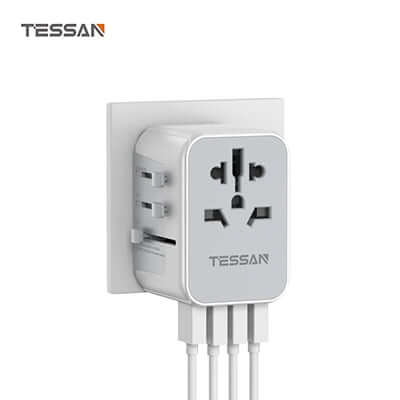 TESSAN Travel Adapter with 4 USB Ports mounted on a wall with multiple charging outlets.