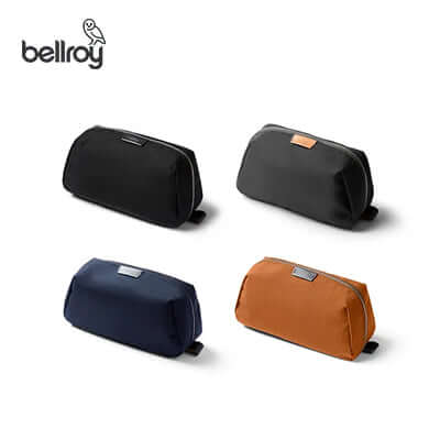 Bellroy Toiletry Kit Plus in black, navy, and orange colors, ideal corporate gift for travel essentials.